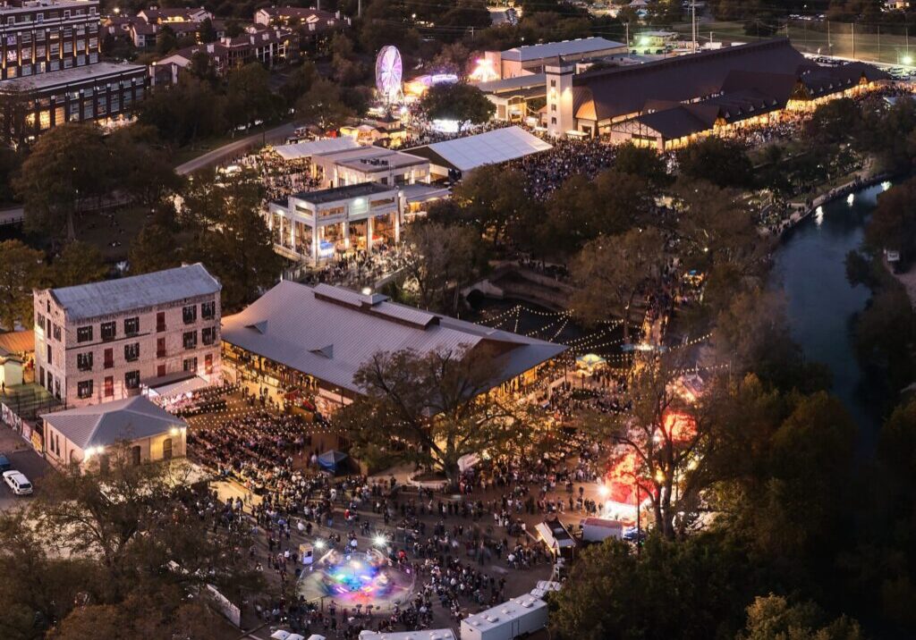 An aerial view of the town during the evening with lights